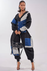 COMFY COZY SWEATSHIRT JUMPSUIT IN PATCHWORK DENIM IN BLACK