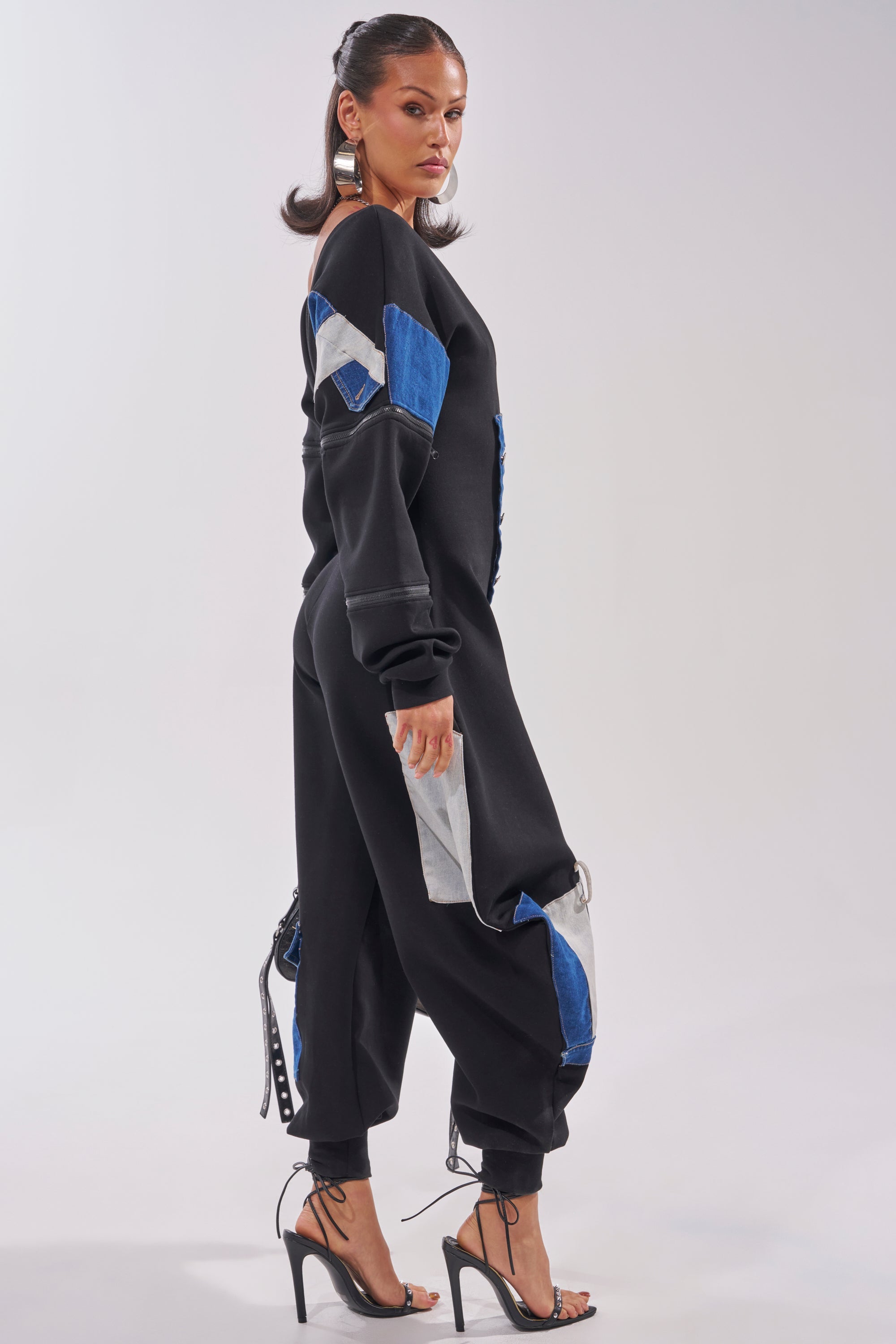 COMFY COZY SWEATSHIRT JUMPSUIT IN PATCHWORK DENIM IN BLACK
