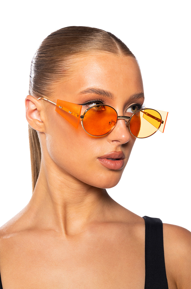CONTEMPORARY ART RIMLESS SUNNIES IN ORANGE