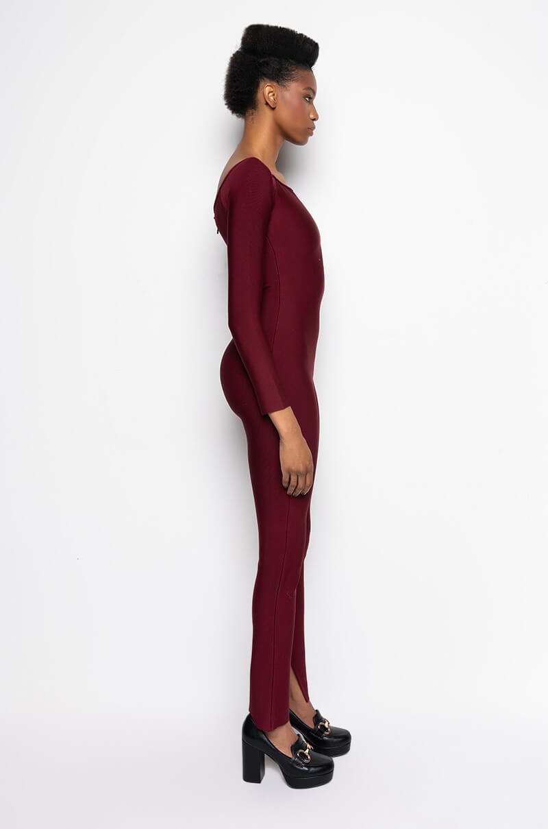 DOES WHAT SHE WANTS BANDAGE JUMPSUIT